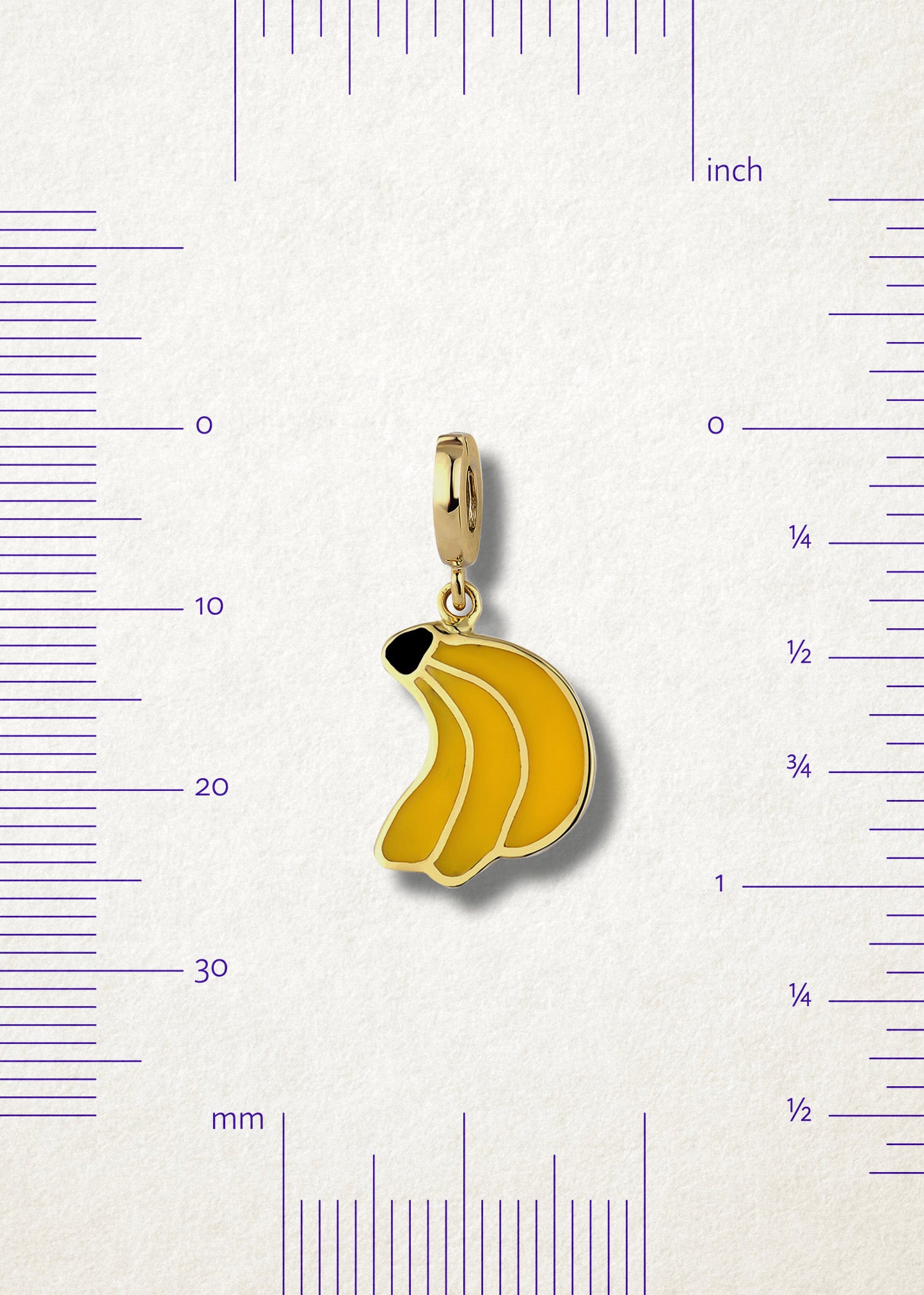 Measurement view of Banana Bliss Charm by whywhy NYC, 14K gold charm with yellow enamel, approx. 26mm in length.