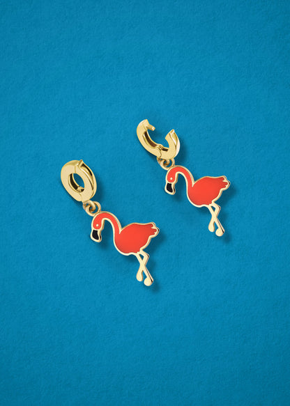 Flamingo Flair Charm showing both open and closed views of the 14K solid gold clip, with vibrant orange enamel accents, displayed on a blue background.