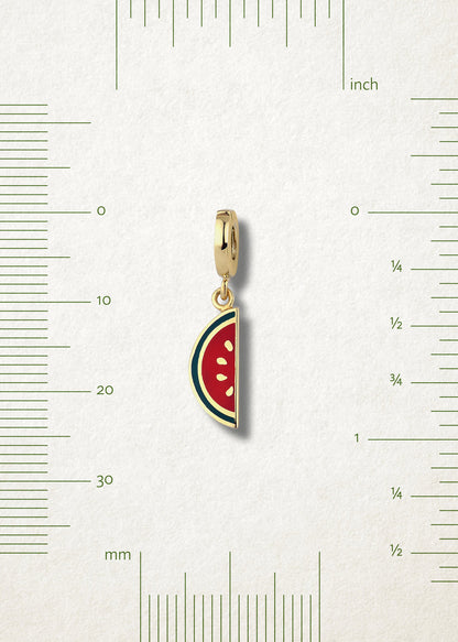 Measurement view of Watermelon Wonder Charm by whywhy NYC, 14K gold and enamel, approx. 25mm length.